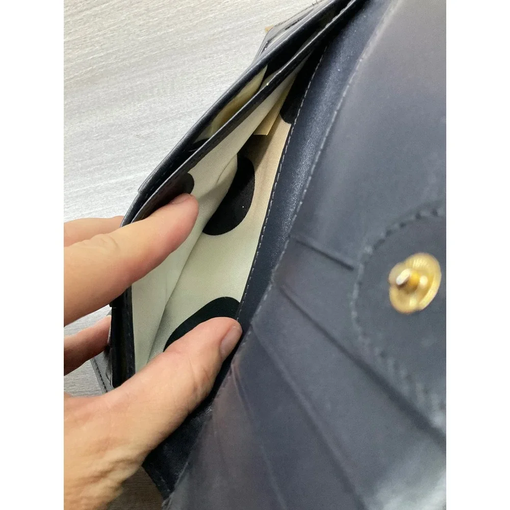 KATE SPADE NEW YORK CEDAR STREET BIFOLD STACY WALLET IN BLACK